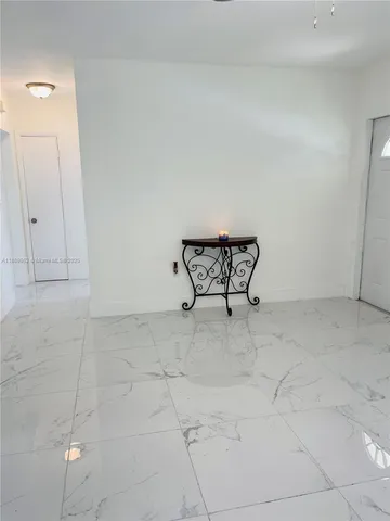 a view of workspace with refrigerator