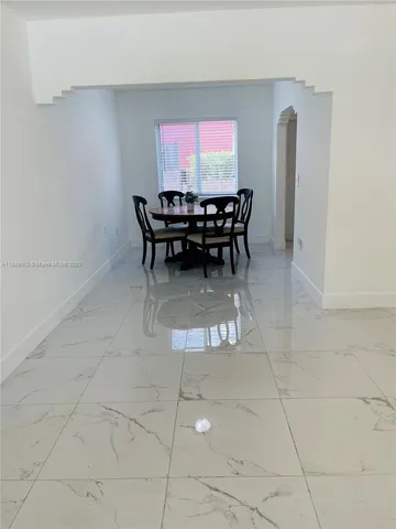 a room with furniture and window