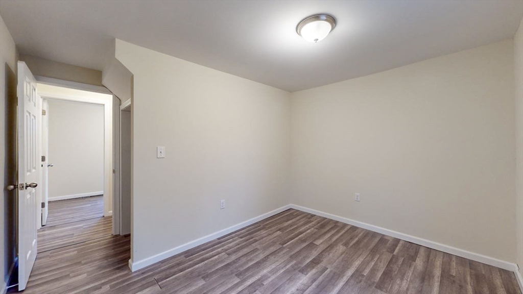 195 Riverton Road Springfield, MA 01109 - Photo 27 of 42 wooden floor in an empty room