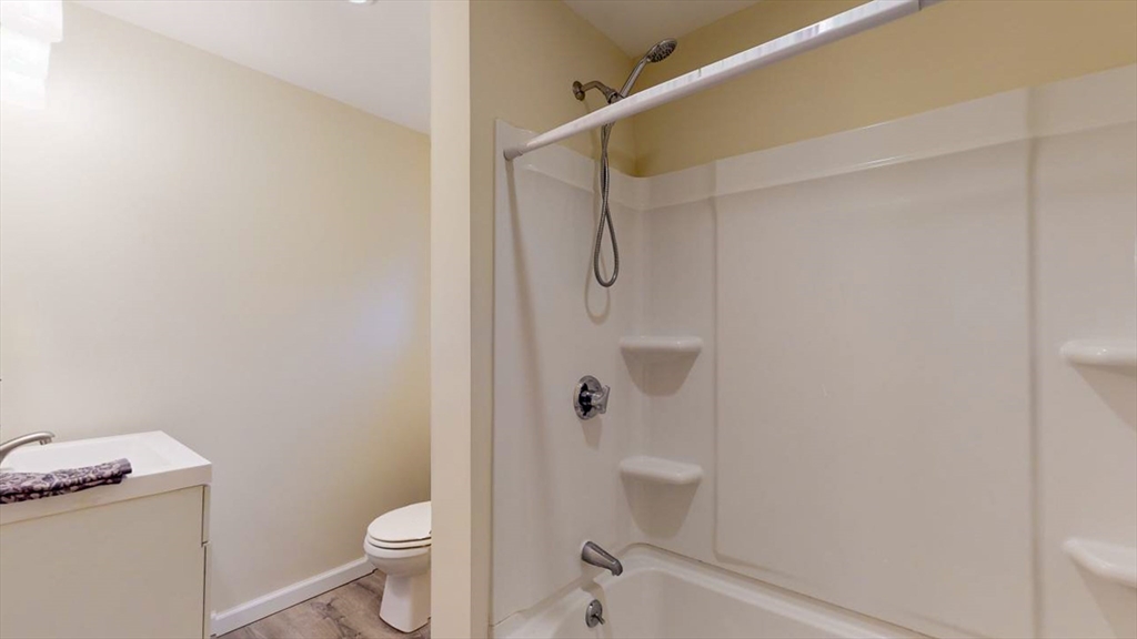 195 Riverton Road Springfield, MA 01109 - Photo 34 of 42 a bathroom with a shower and toilet