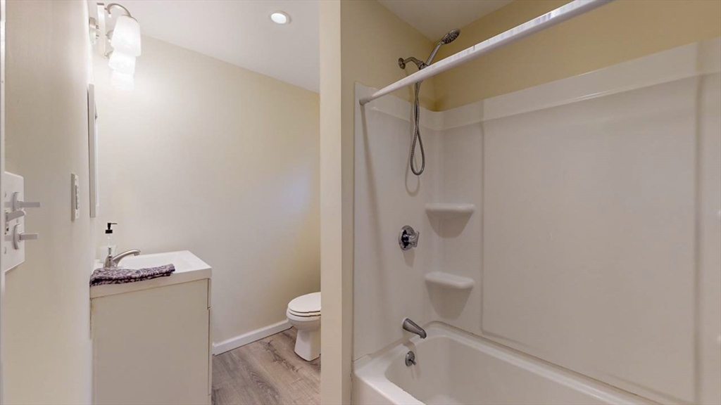 195 Riverton Road Springfield, MA 01109 - Photo 35 of 42 a bathroom with a toilet and a shower