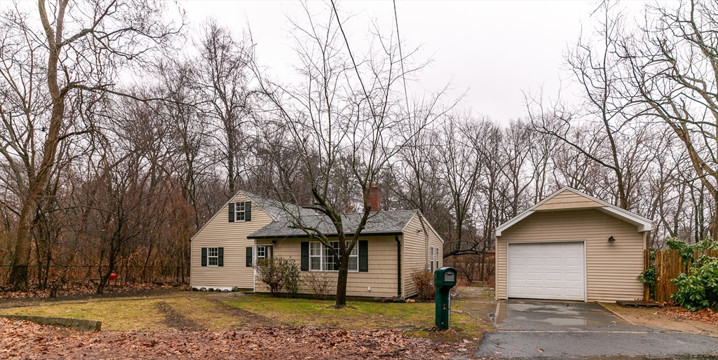 195 Riverton Road Springfield, MA 01109 - Photo 36 of 42 a front view of a house with a yard