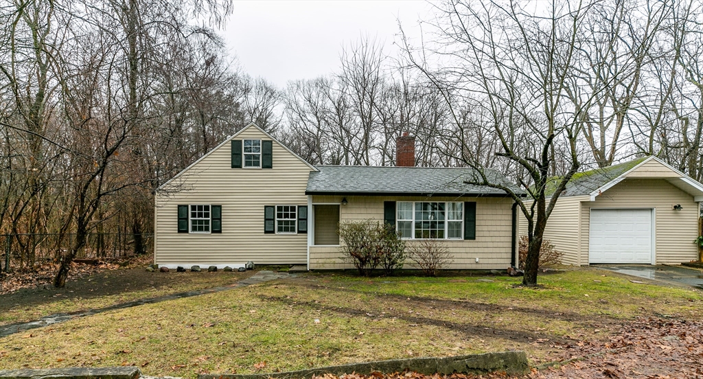 195 Riverton Road Springfield, MA 01109 - Photo 37 of 42 front view of a house with a yard