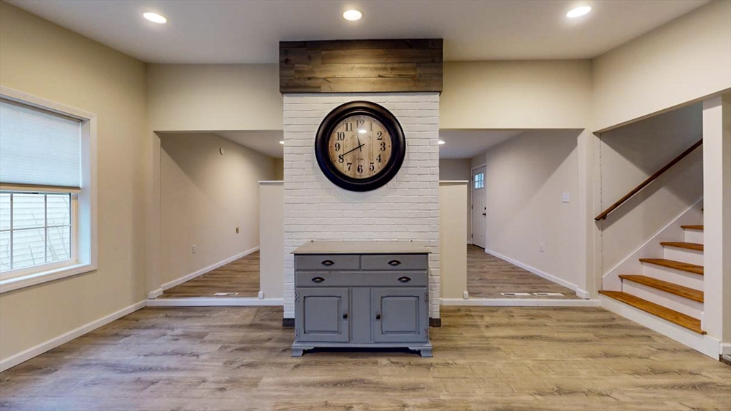 195 Riverton Road Springfield, MA 01109 - Photo 4 of 42 an entryway with wooden floor and a sink