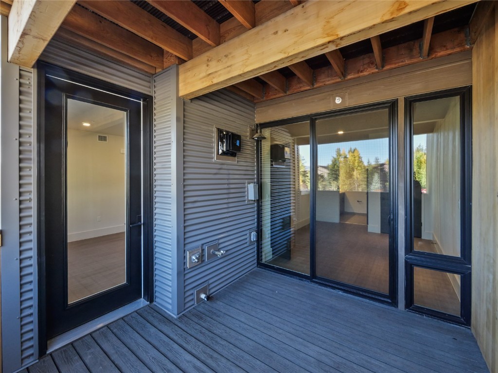 80 West Main Street, Unit 212 Frisco, CO 80443 - Photo 19 of 45 a view of a hallway with wooden floor