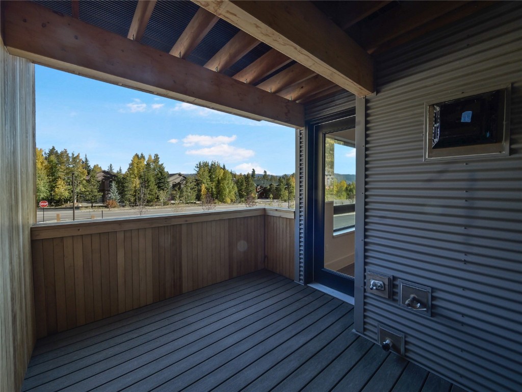 80 West Main Street, Unit 212 Frisco, CO 80443 - Photo 20 of 45 a view of a balcony with wooden floor