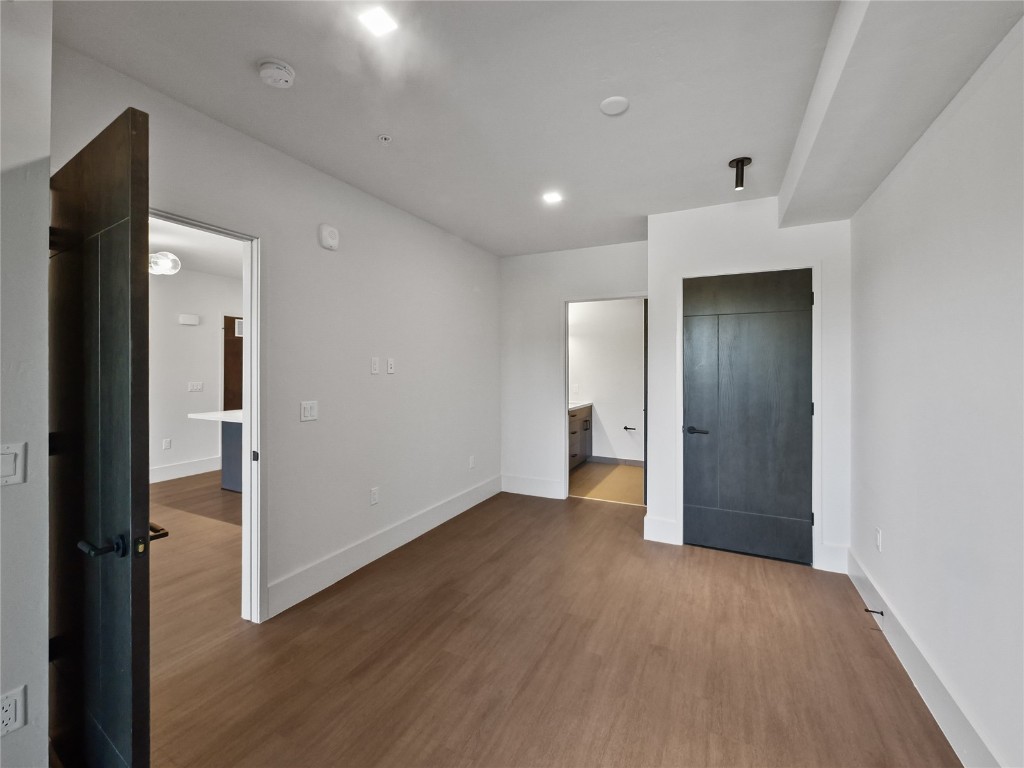 80 West Main Street, Unit 212 Frisco, CO 80443 - Photo 23 of 45 wooden floor in an empty room