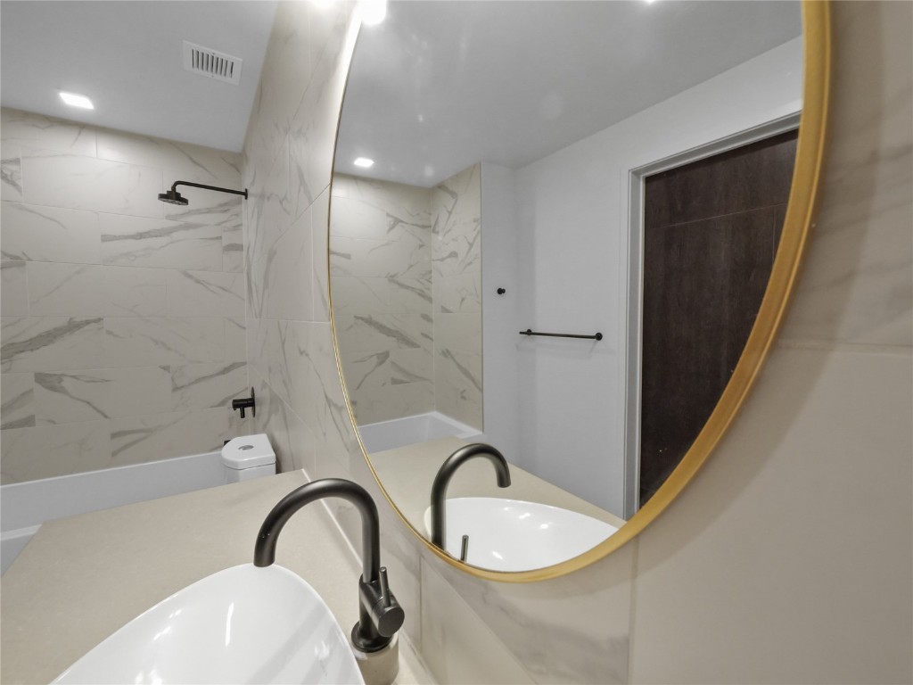 80 West Main Street, Unit 212 Frisco, CO 80443 - Photo 35 of 45 a bathroom with a sink a toilet and shower