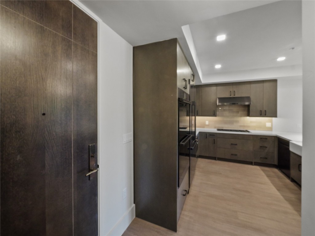 80 West Main Street, Unit 212 Frisco, CO 80443 - Photo 37 of 45 a kitchen with stainless steel appliances a refrigerator and a sink