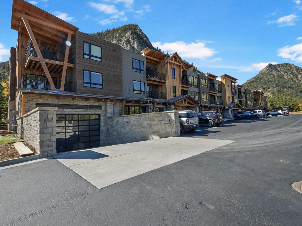 80 West Main Street, Unit 212 Frisco, CO 80443 - Photo 39 of 45 a large building with a street