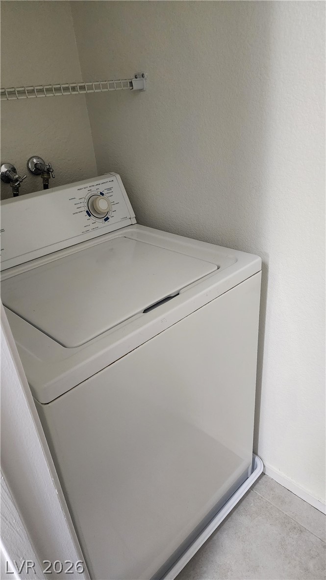 6650 West Warm Springs Road, Unit 2118 Las Vegas, NV 89118 - Photo 38 of 41 A dedicated laundry space provides practical, in-home convenience.