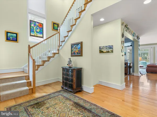 a kitchen with granite countertop a sink and cabinets