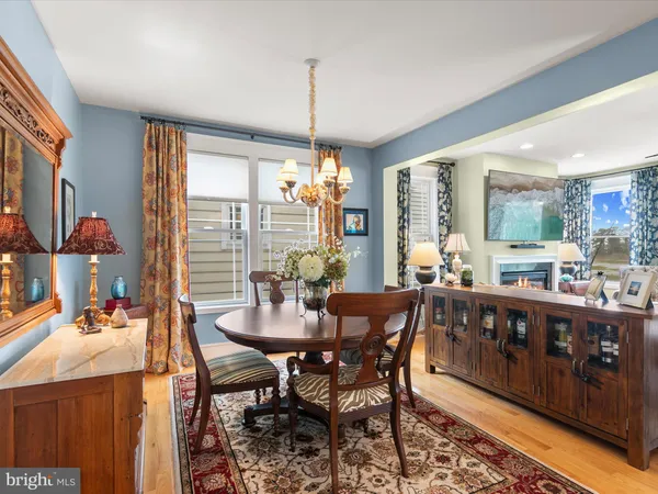 a bed room with furniture and a flat screen tv