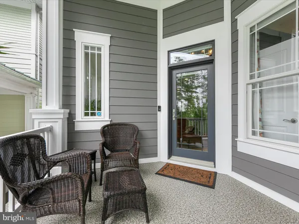 a kitchen with stainless steel appliances granite countertop a refrigerator a stove top oven a sink and dishwasher