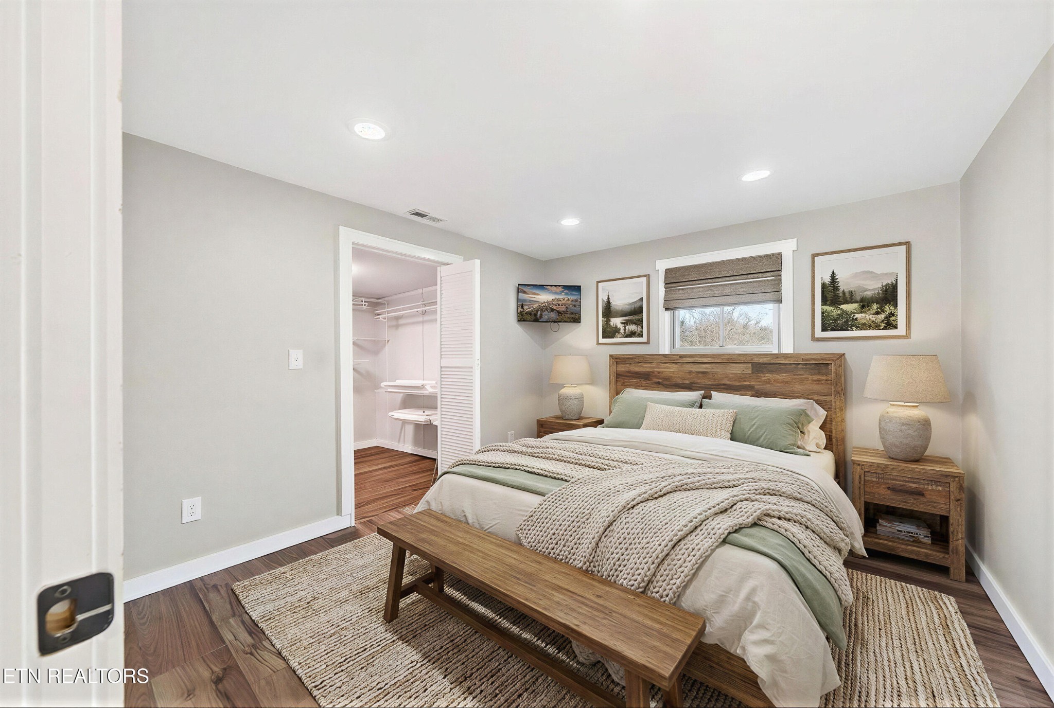 2496 Chestnut Hill Road Crossville, TN 38571 - Photo 13 of 38 a bedroom with a bed and a night stand