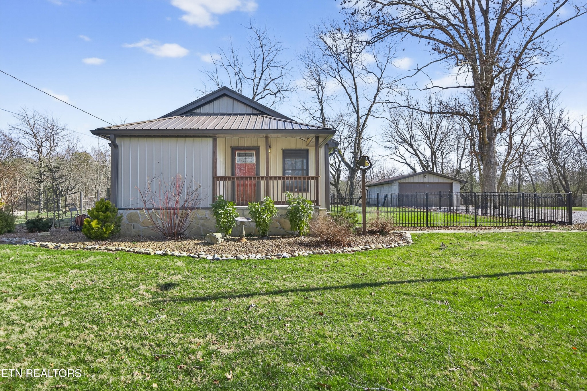 2496 Chestnut Hill Road Crossville, TN 38571 - Photo 31 of 38 a front view of a house with a yard