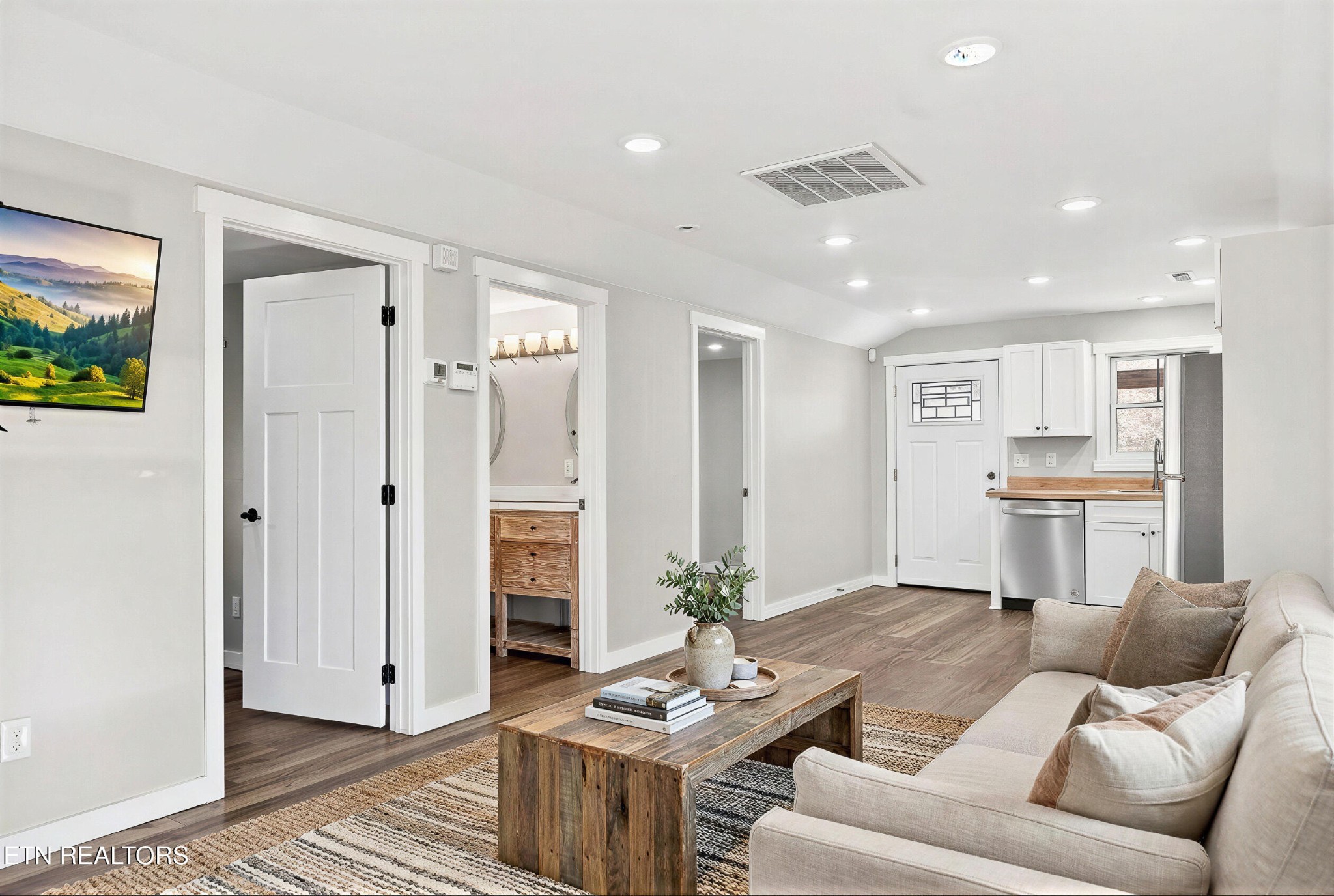 2496 Chestnut Hill Road Crossville, TN 38571 - Photo 8 of 38 a living room with furniture and a dining table with kitchen view