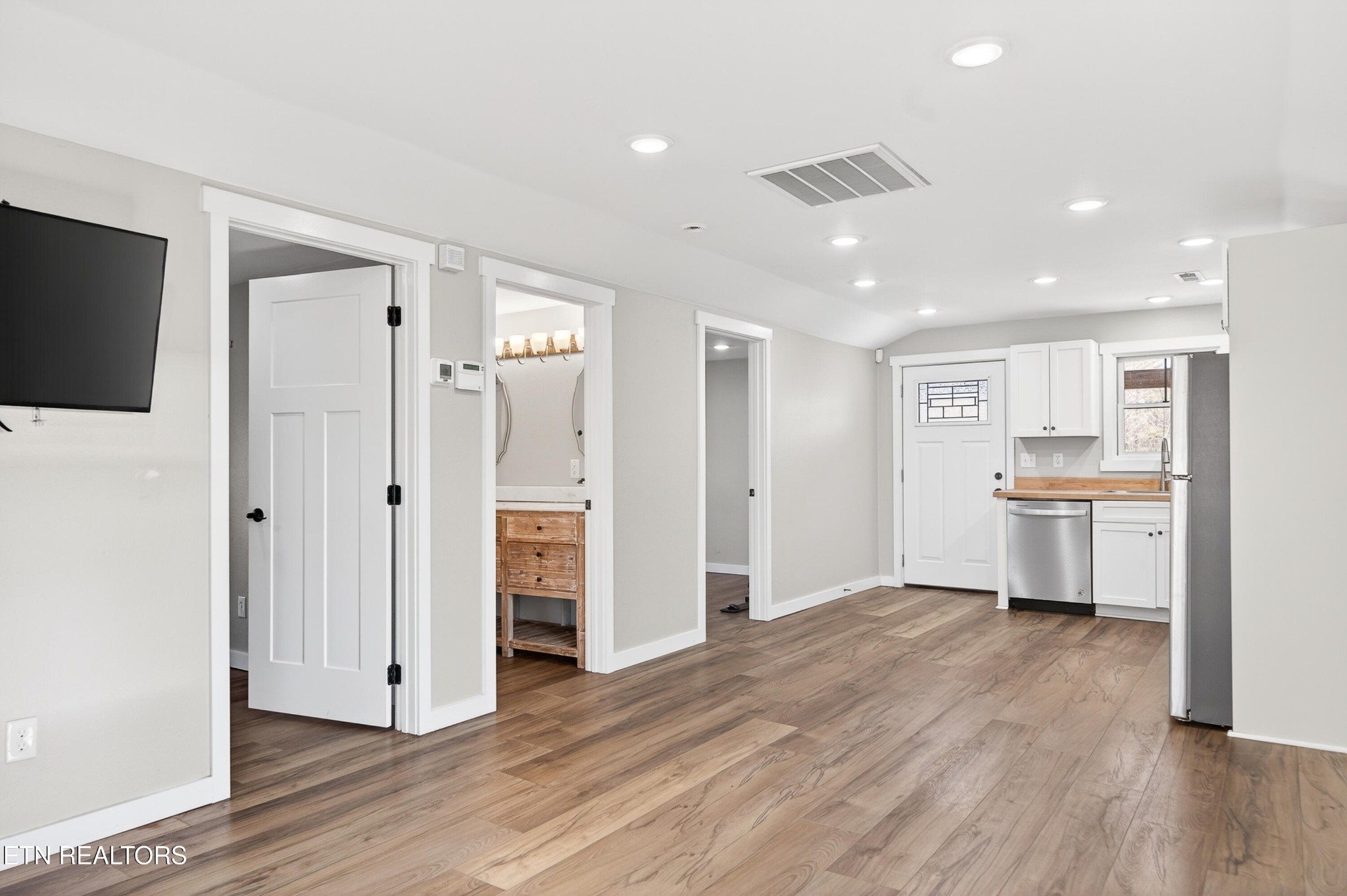 2496 Chestnut Hill Road Crossville, TN 38571 - Photo 9 of 38 a view of a kitchen with wooden floor and a sink