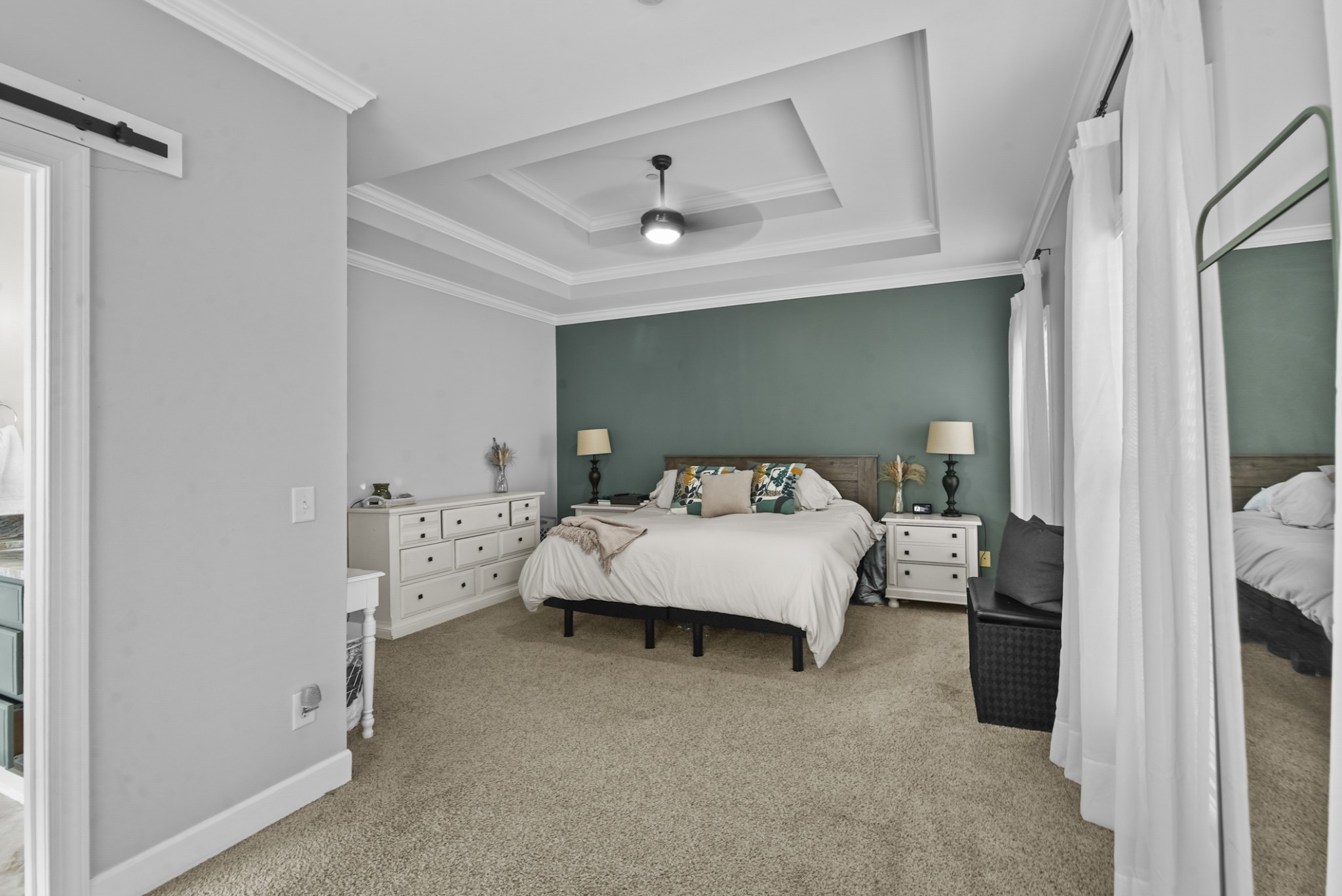 1191 Filmore Harris Road Pleasant View, TN 37146 - Photo 11 of 24 a bedroom with a bed and a chandelier