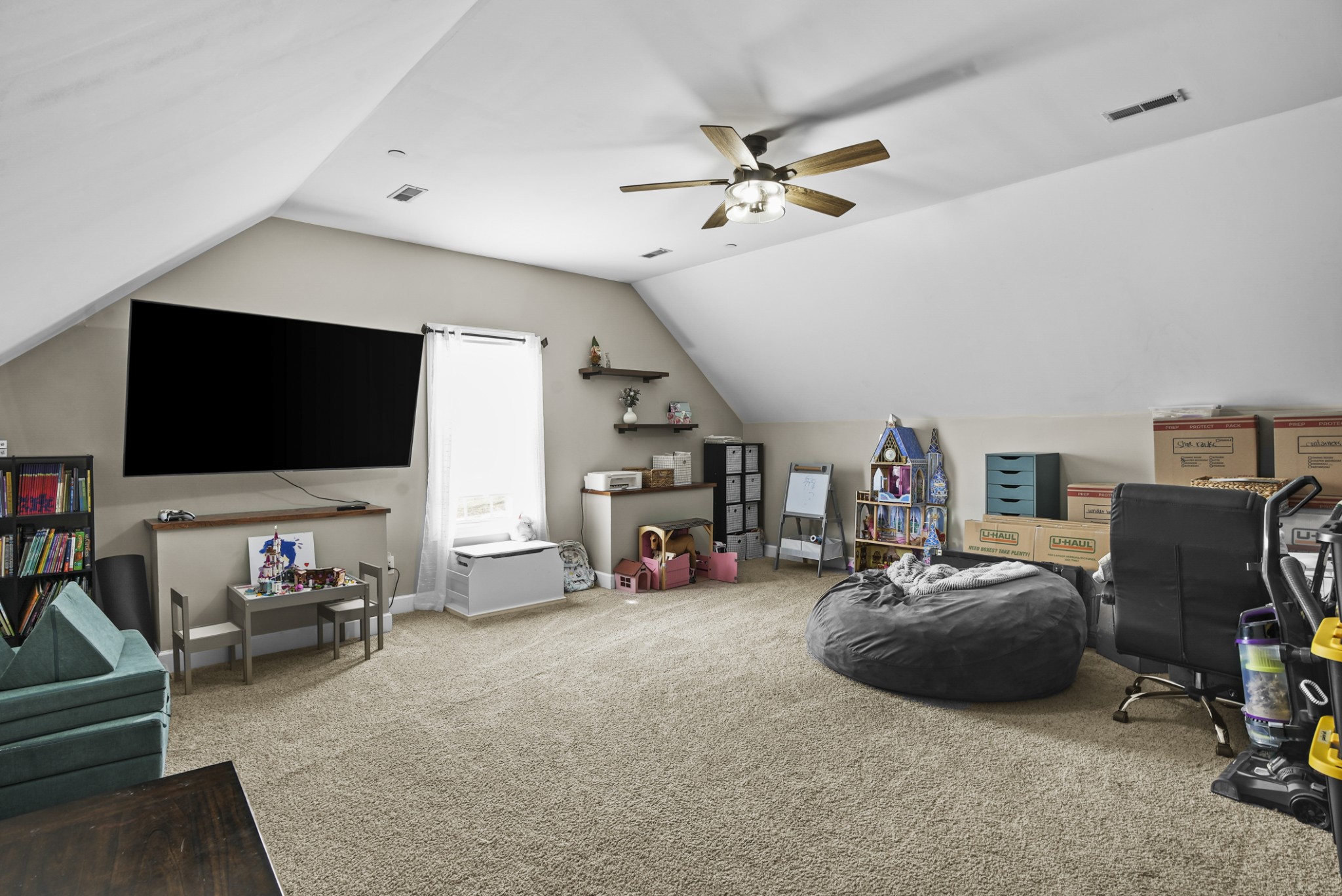 1191 Filmore Harris Road Pleasant View, TN 37146 - Photo 21 of 24 a living room with furniture and a flat screen tv