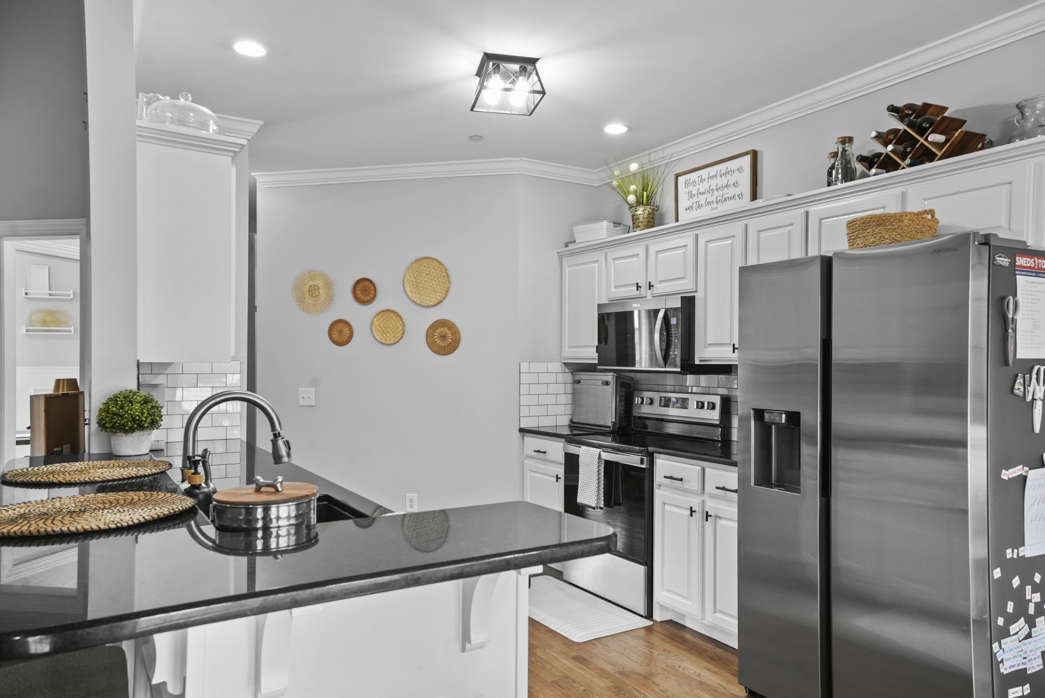 1191 Filmore Harris Road Pleasant View, TN 37146 - Photo 9 of 24 a kitchen with stainless steel appliances granite countertop a refrigerator and a sink