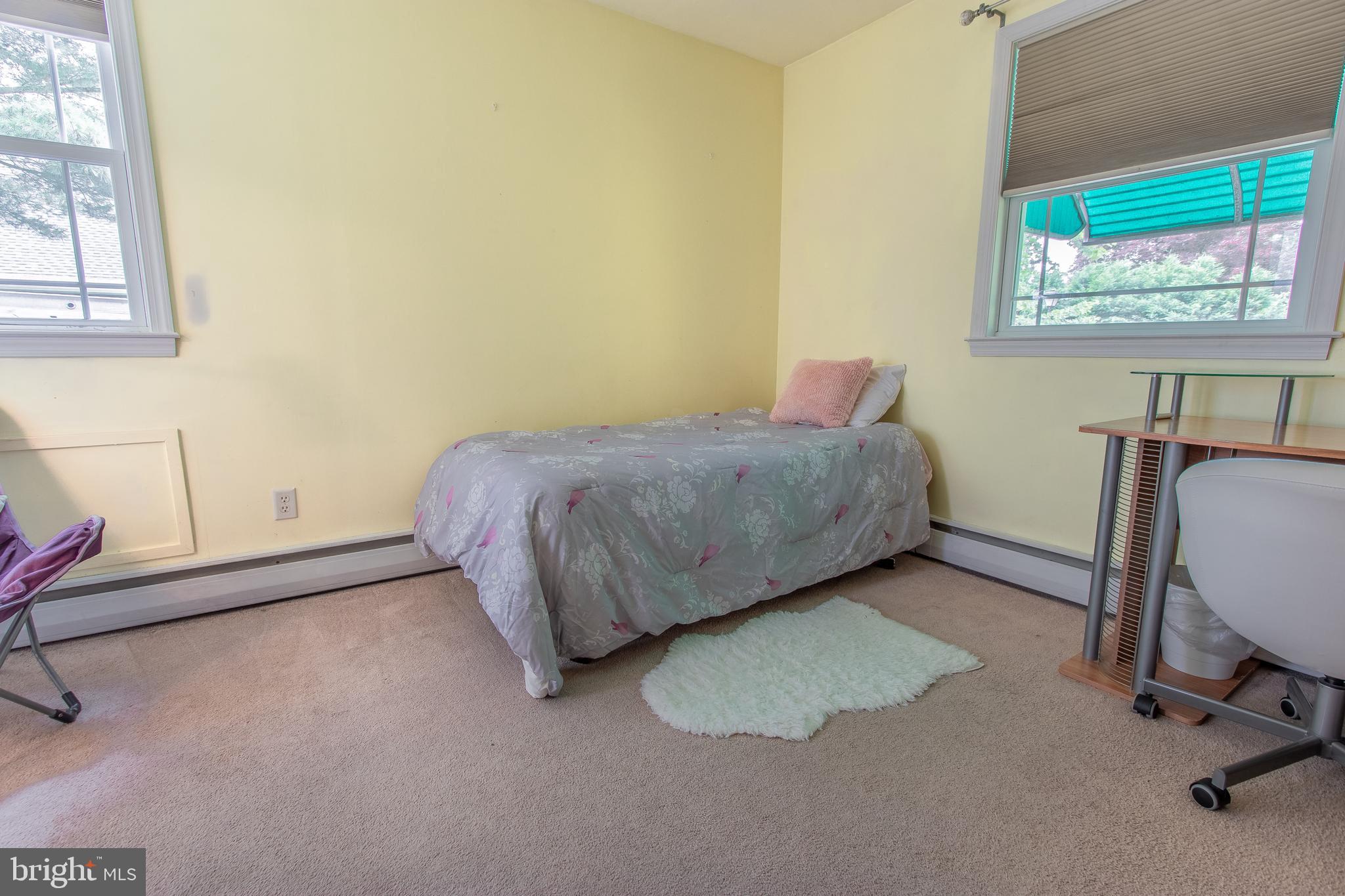 143 Rockglen Road Wynnewood, PA 19096 - Photo 16 of 38 Main Level Bedroom with walk-in closet & en-suite
