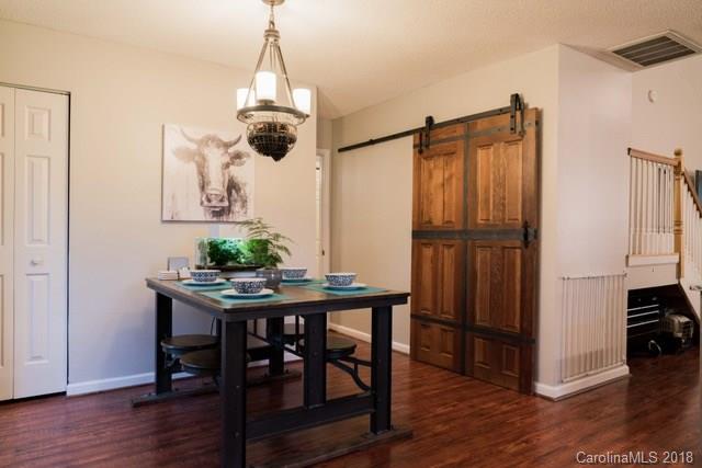 8209 Golf Ridge Drive Charlotte, NC 28277 - Photo 13 of 21 a dining room with furniture and wooden floor