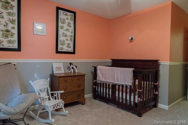 8209 Golf Ridge Drive Charlotte, NC 28277 - Photo 20 of 21 a view of a bedroom with furniture and toys