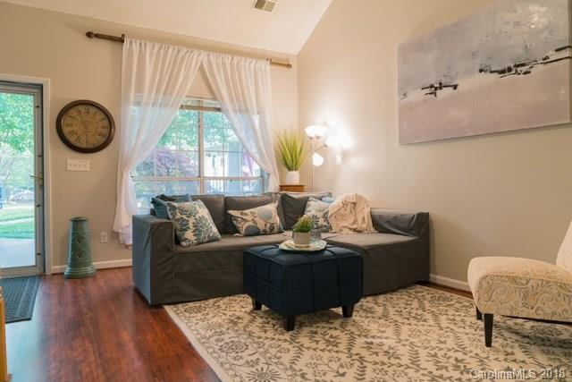 8209 Golf Ridge Drive Charlotte, NC 28277 - Photo 7 of 21 a living room with furniture and a large window