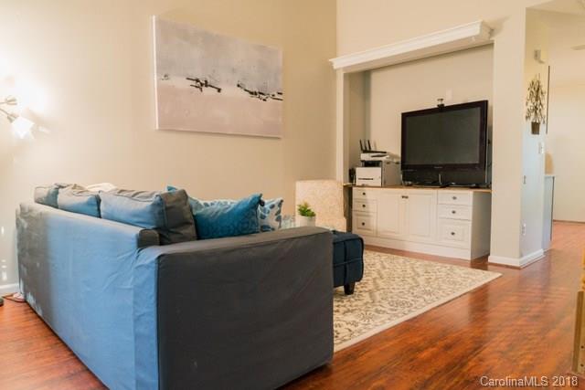 8209 Golf Ridge Drive Charlotte, NC 28277 - Photo 10 of 21 a living room with furniture and a flat screen tv