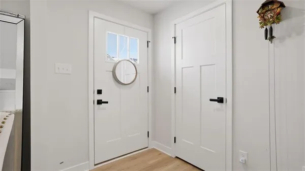 a view of a bathroom from a hallway