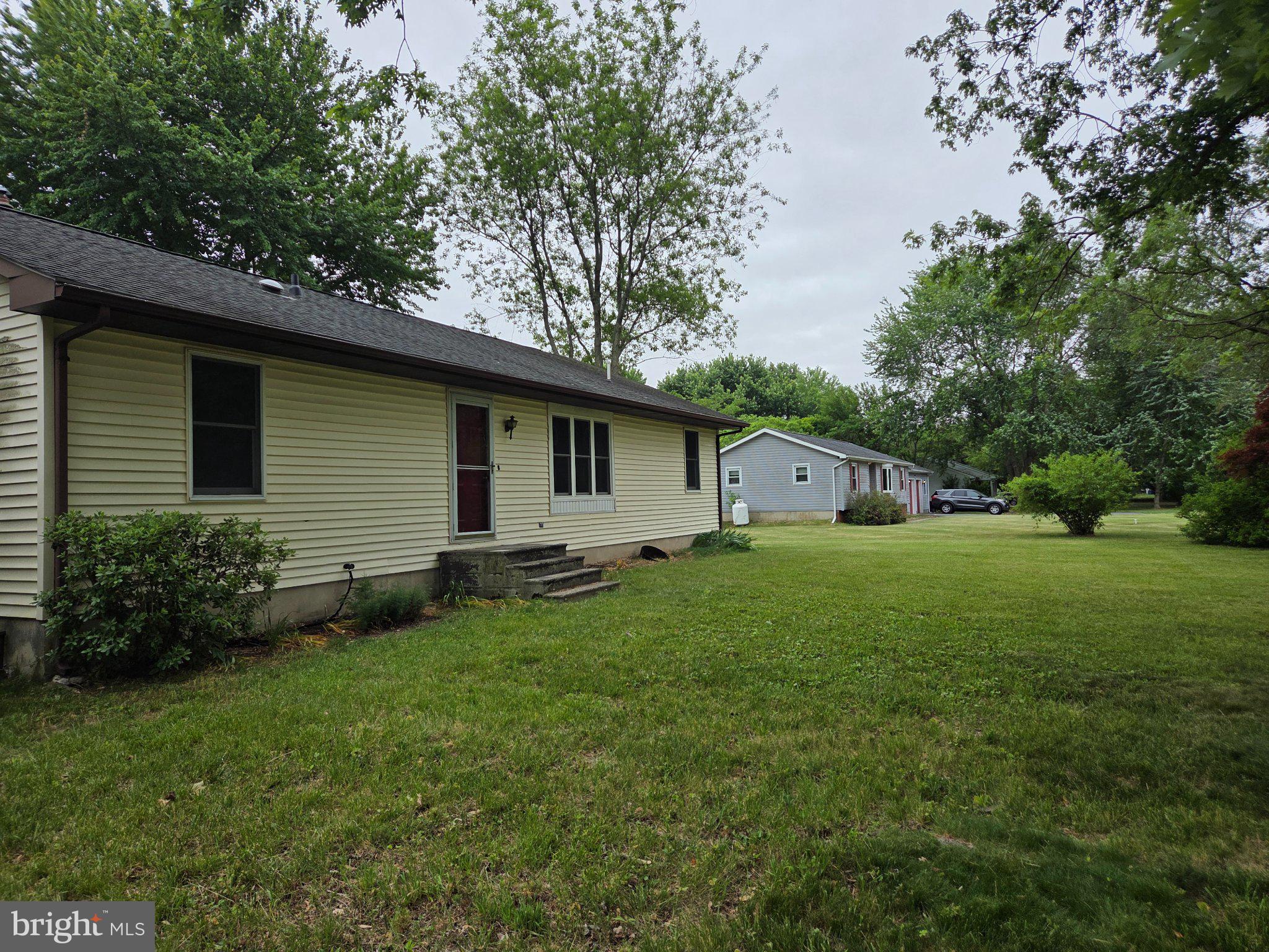 1378 Woodlytown Road Magnolia, DE 19962 - Photo 1 of 15 a house view with a garden space