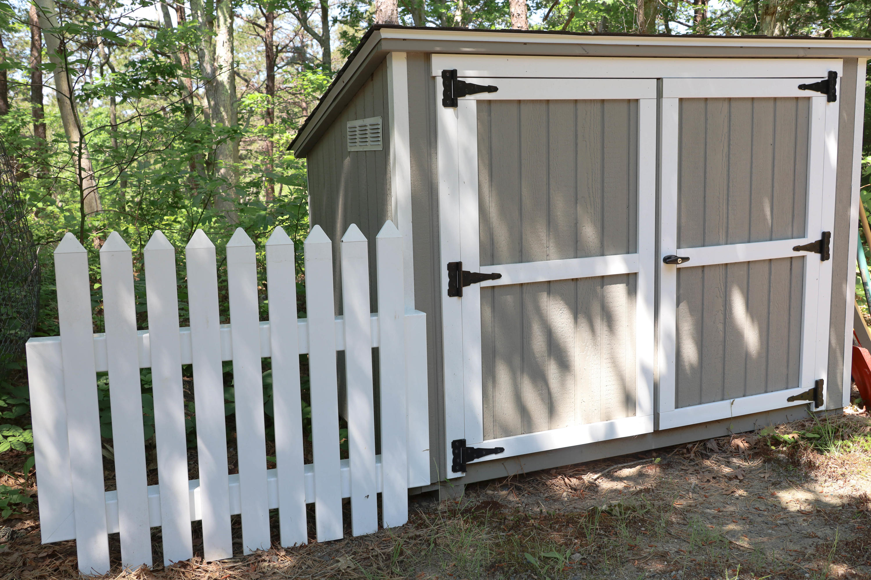 91 Quashnet Road Mashpee, MA 02649 - Photo 4 of 16 a view of wooden fence