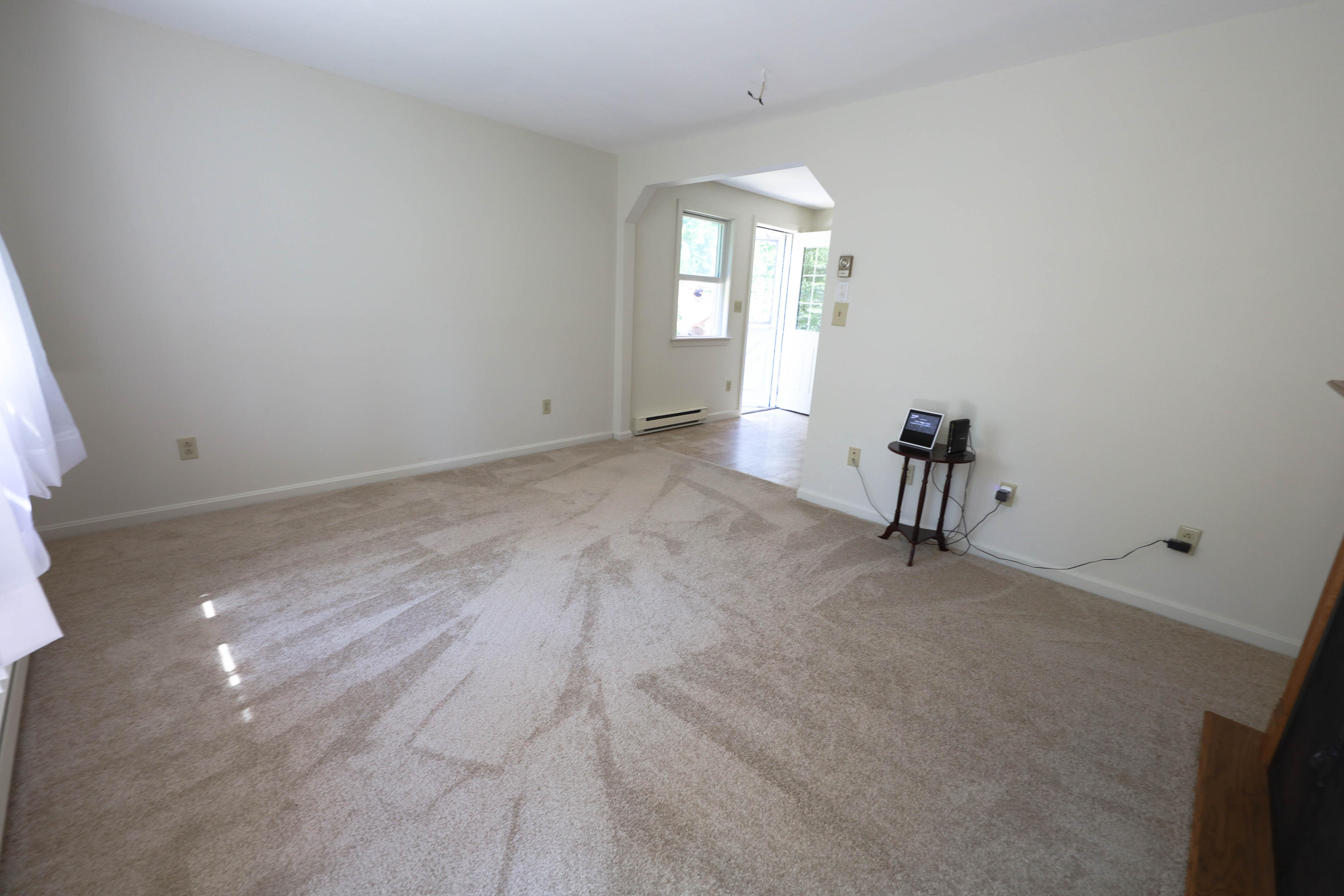 91 Quashnet Road Mashpee, MA 02649 - Photo 10 of 16 an empty room with windows and closet
