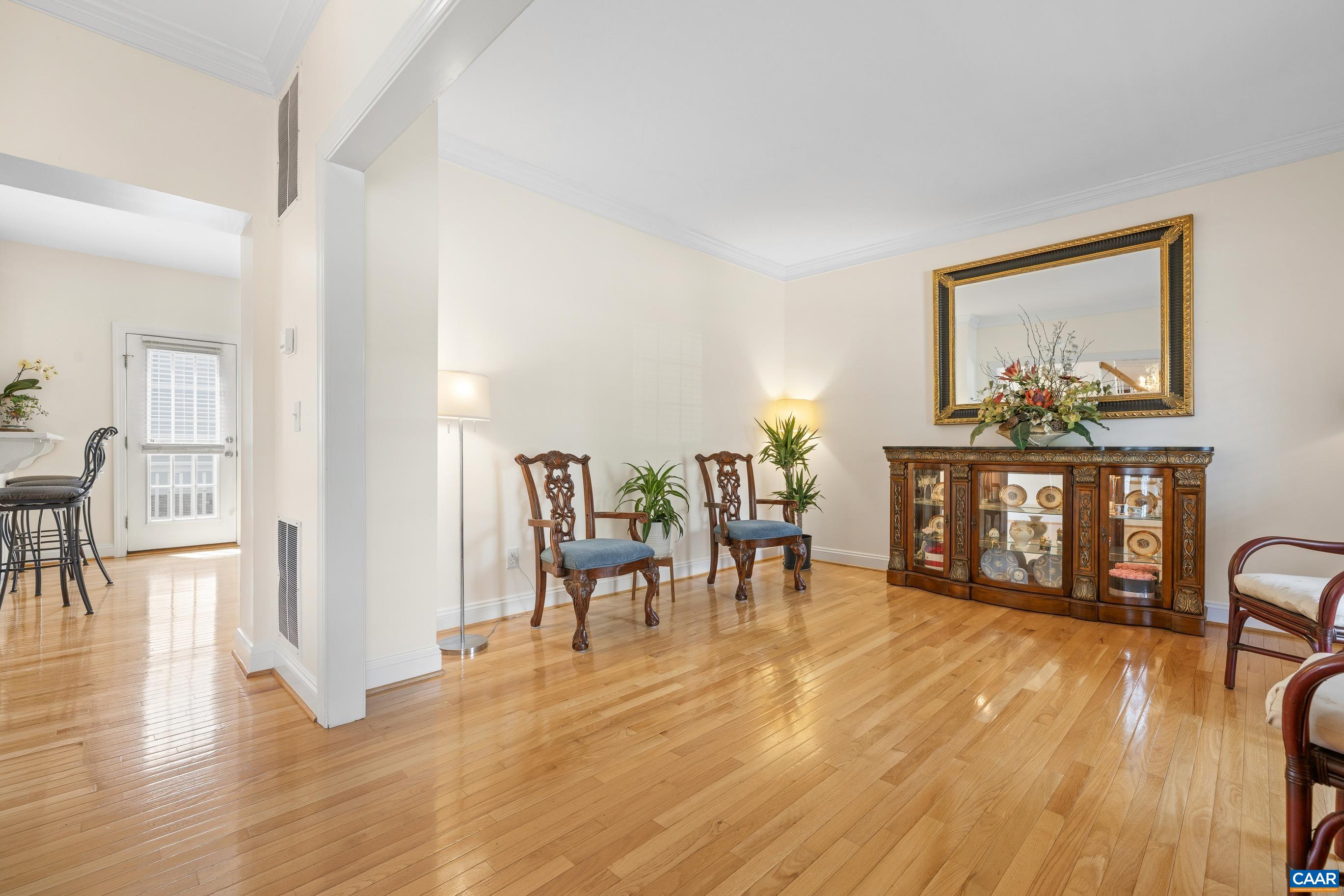 1236 Amber Ridge Road Charlottesville, VA 22901 - Photo 10 of 56 a living room with furniture and a wooden floor