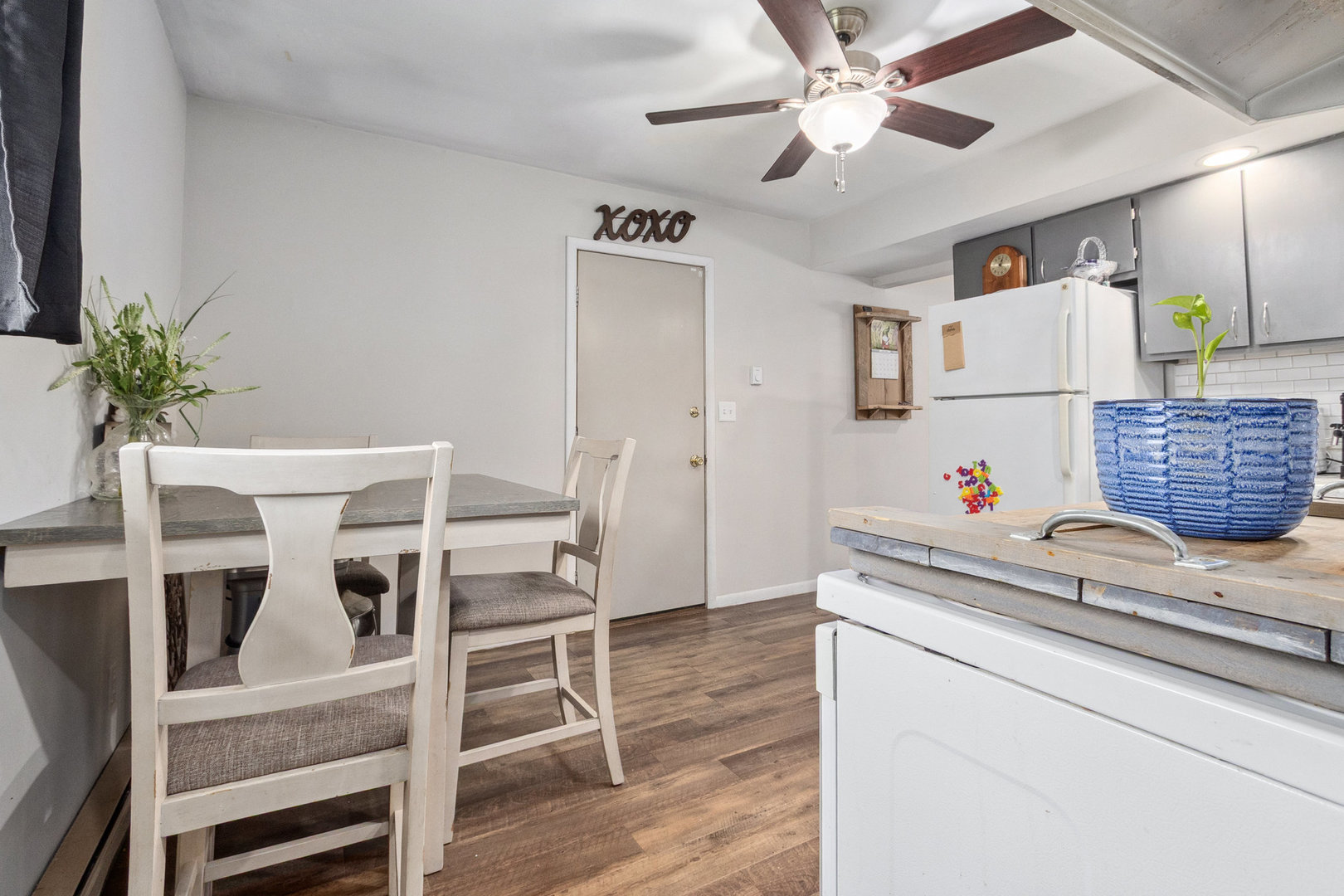 309 South Joliet Street, Unit 309 Wilmington, IL 60481 - Photo 8 of 12 a kitchen with a table and chairs