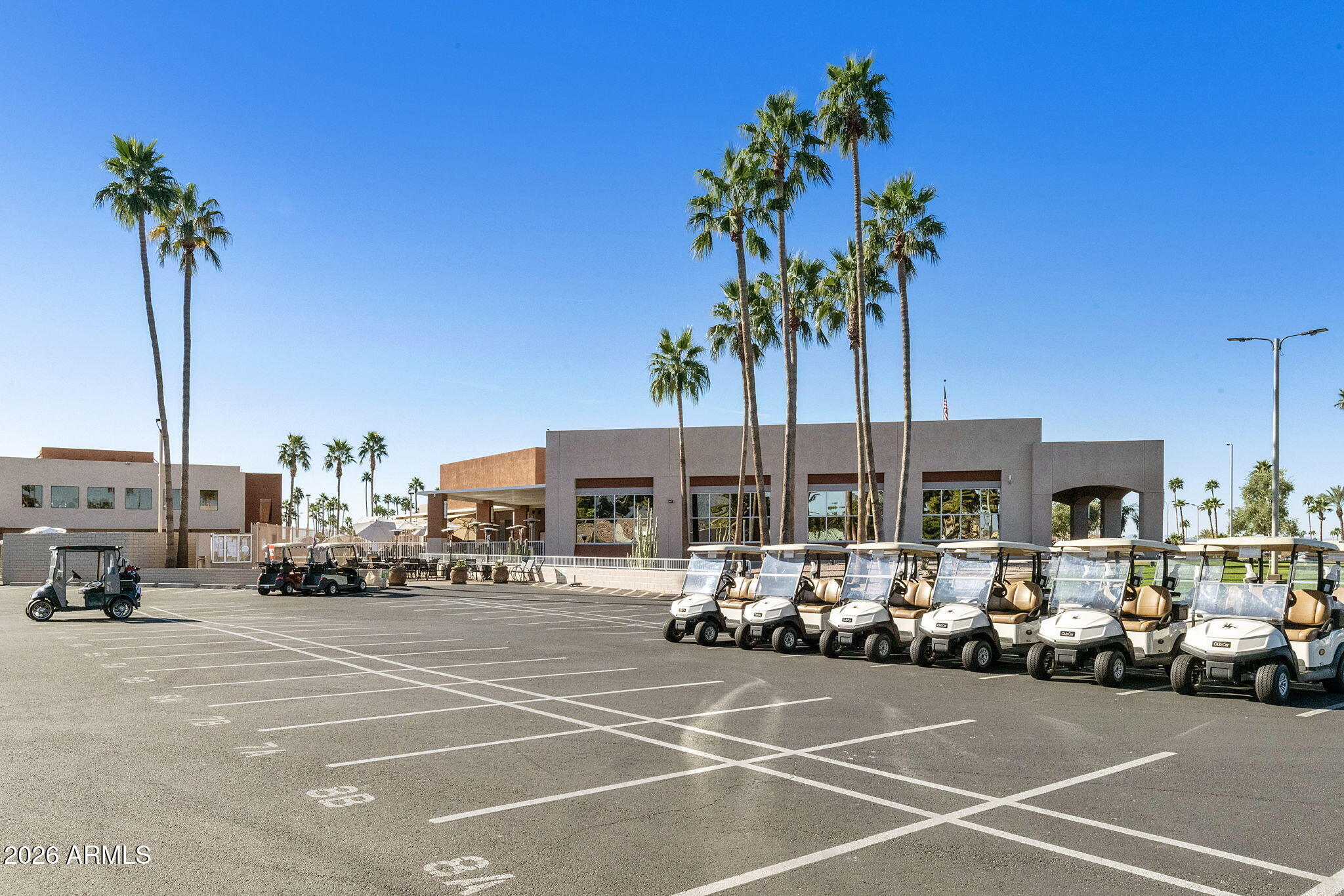 2435 North Higley Road Mesa, AZ 85215 - Photo 64 of 84 a group of cars parked in front of building