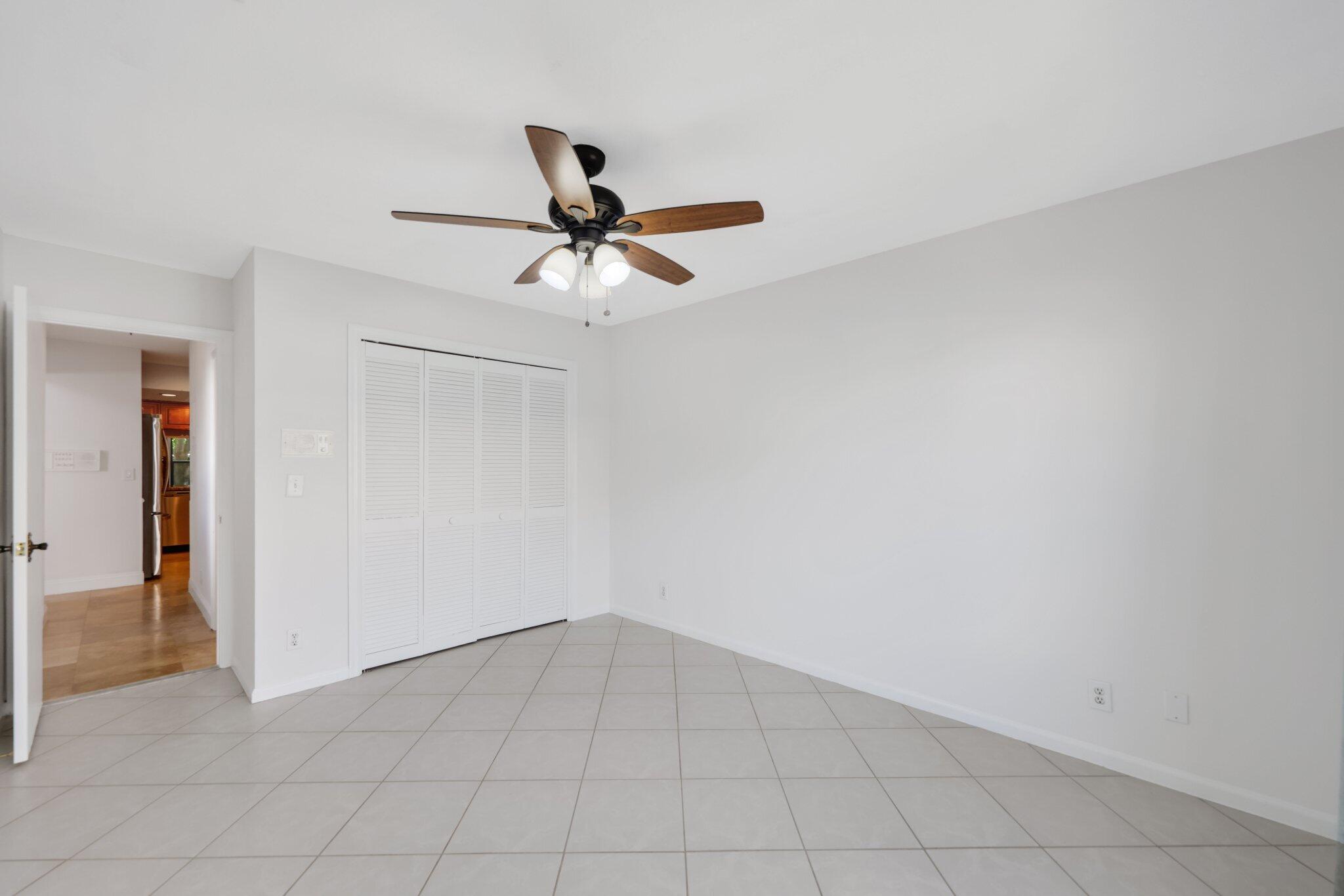 361 West Camino Real, Unit 9 Boca Raton, FL 33432 - Photo 18 of 37 wooden floor in an empty room