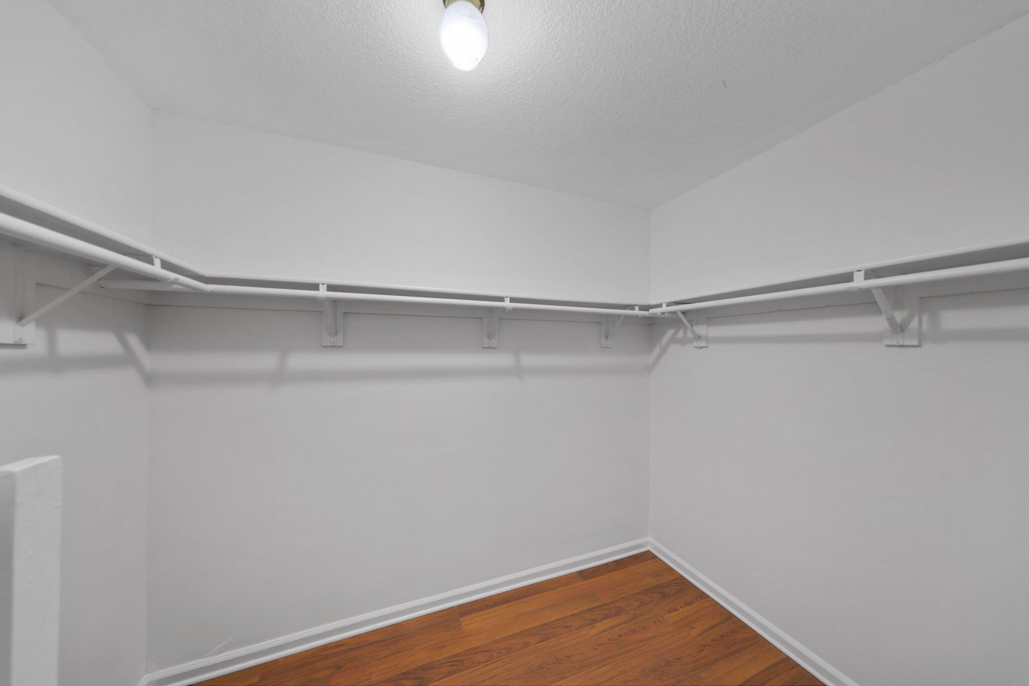 361 West Camino Real, Unit 9 Boca Raton, FL 33432 - Photo 24 of 37 a view of a room with racks on the wall