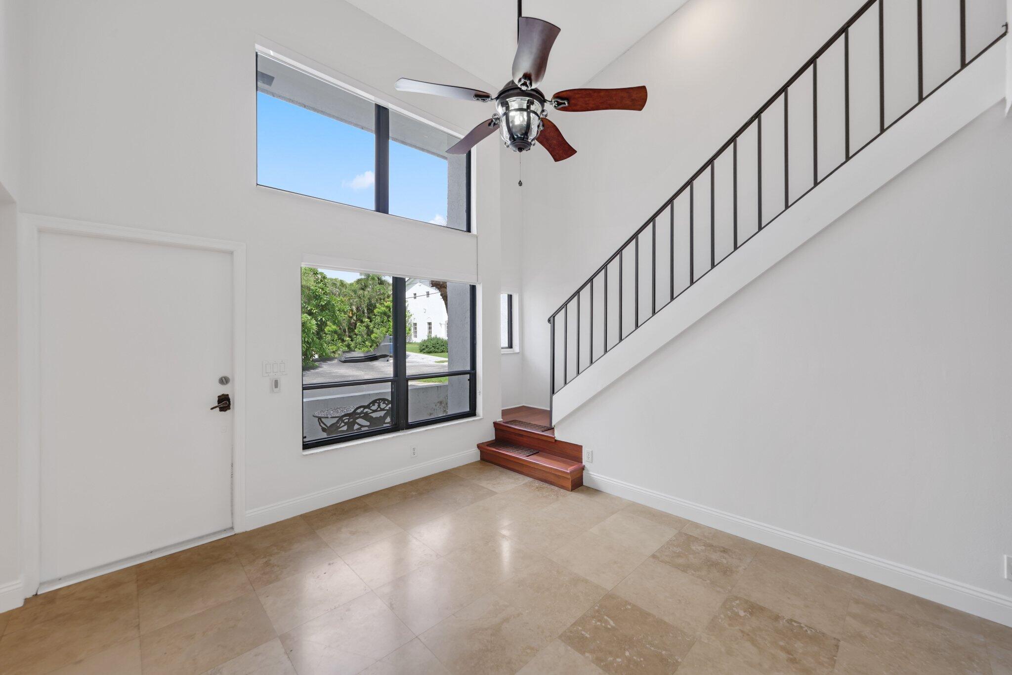 361 West Camino Real, Unit 9 Boca Raton, FL 33432 - Photo 5 of 37 a view of entryway with a front door
