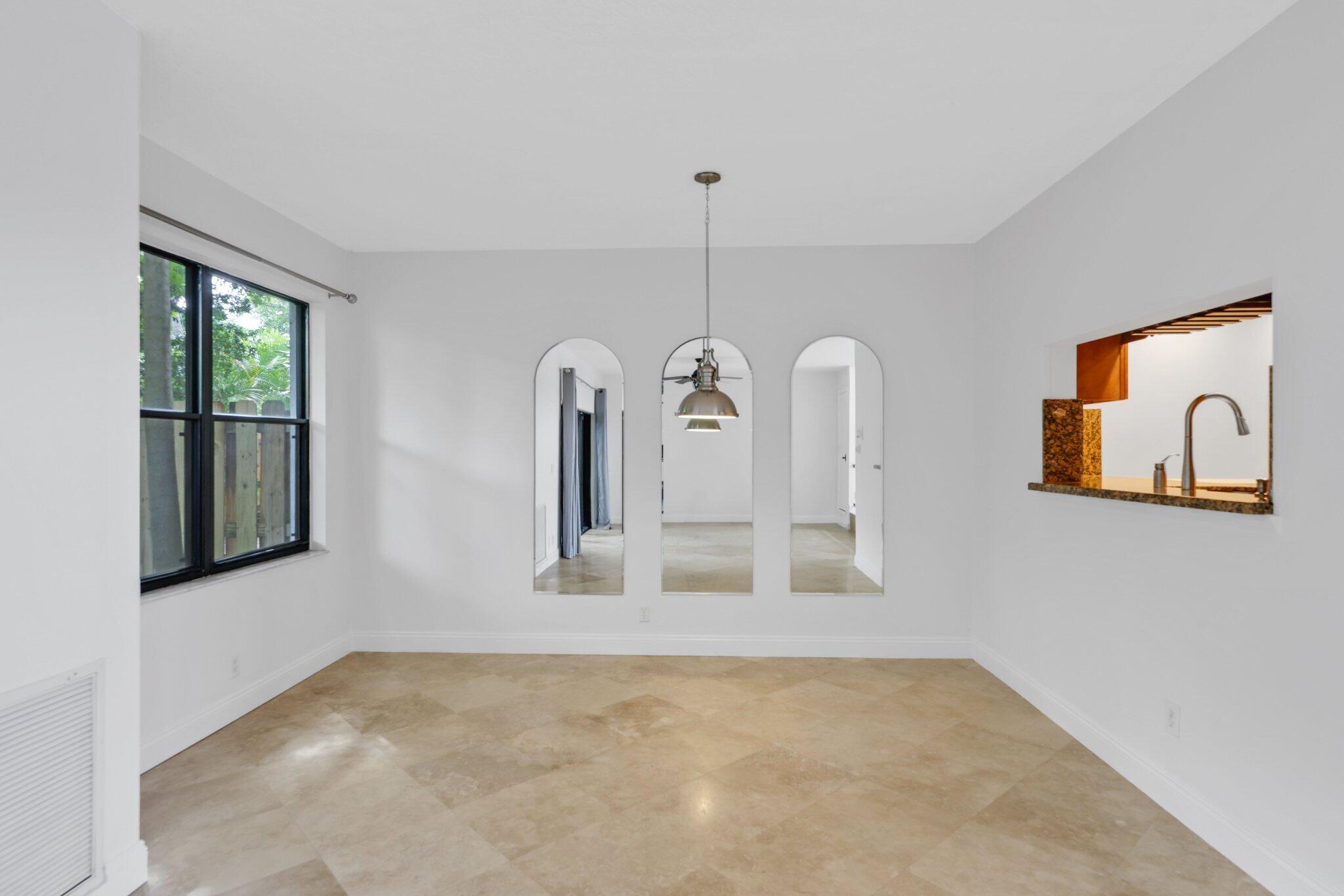 361 West Camino Real, Unit 9 Boca Raton, FL 33432 - Photo 10 of 37 a view of a room with window