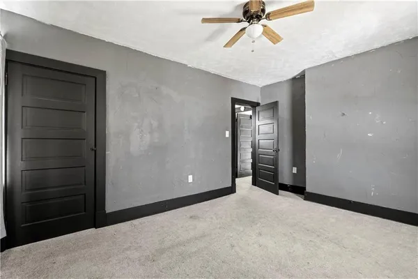 a view of an empty room and window