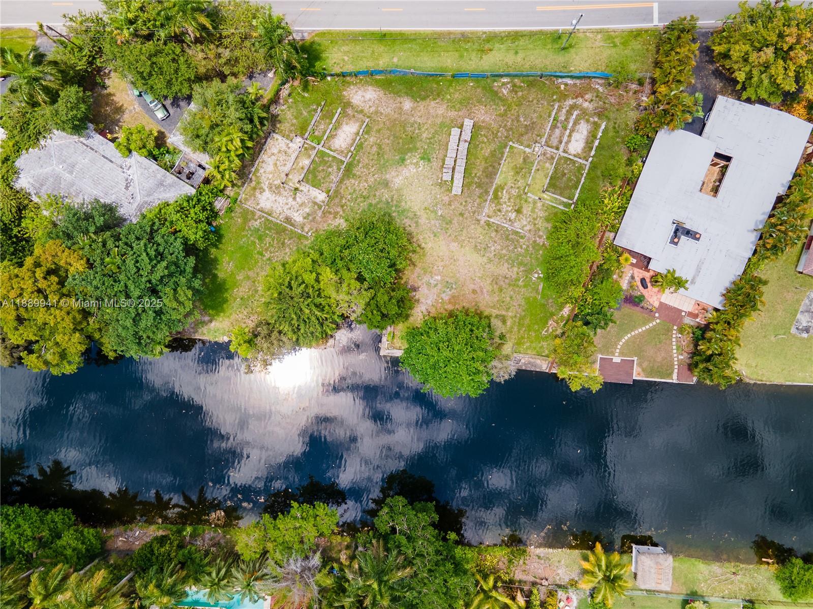 11595 West Biscayne Canal Road Miami, FL 33161 - Photo 13 of 14 an aerial view of residential houses with outdoor space
