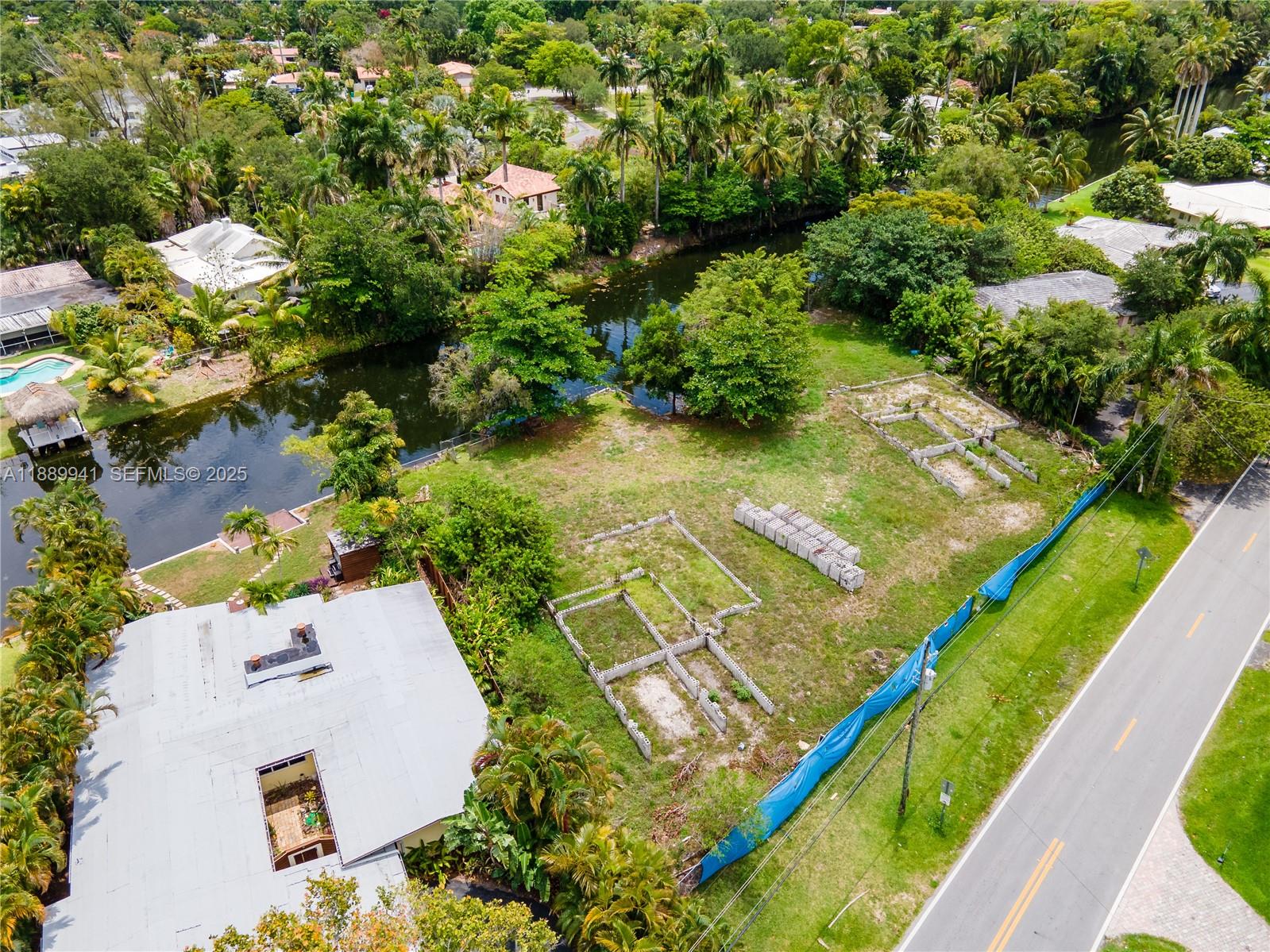 11595 West Biscayne Canal Road Miami, FL 33161 - Photo 10 of 14 an aerial view of a house
