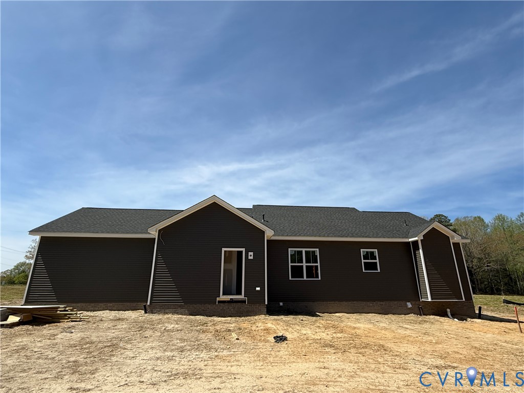 16751 Loving Union Road Disputanta, VA 23842 - Photo 6 of 12 a front view of house with garage