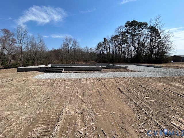 16751 Loving Union Road Disputanta, VA 23842 - Photo 6 of 14 a view of an outdoor space and tennis court