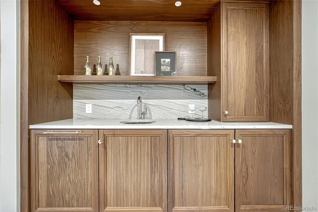 a view of a sink with a mirror