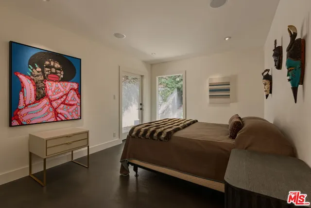 a view of a house with backyard porch and sitting area