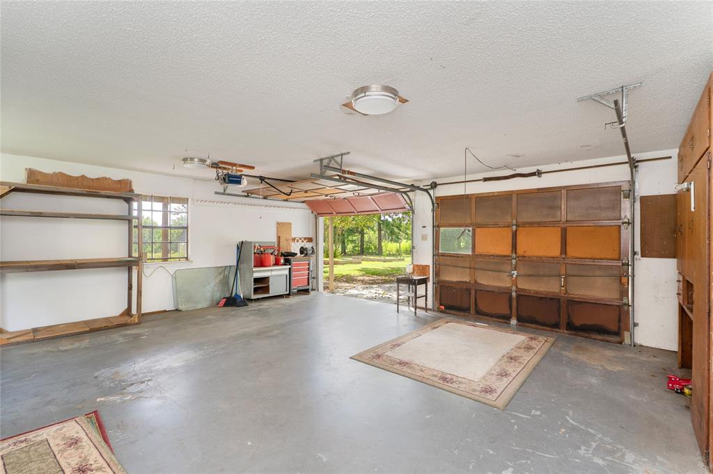 6000 Forrest Lane Canton, TX 75103 - Photo 35 of 37 a view of a garage with parked cars