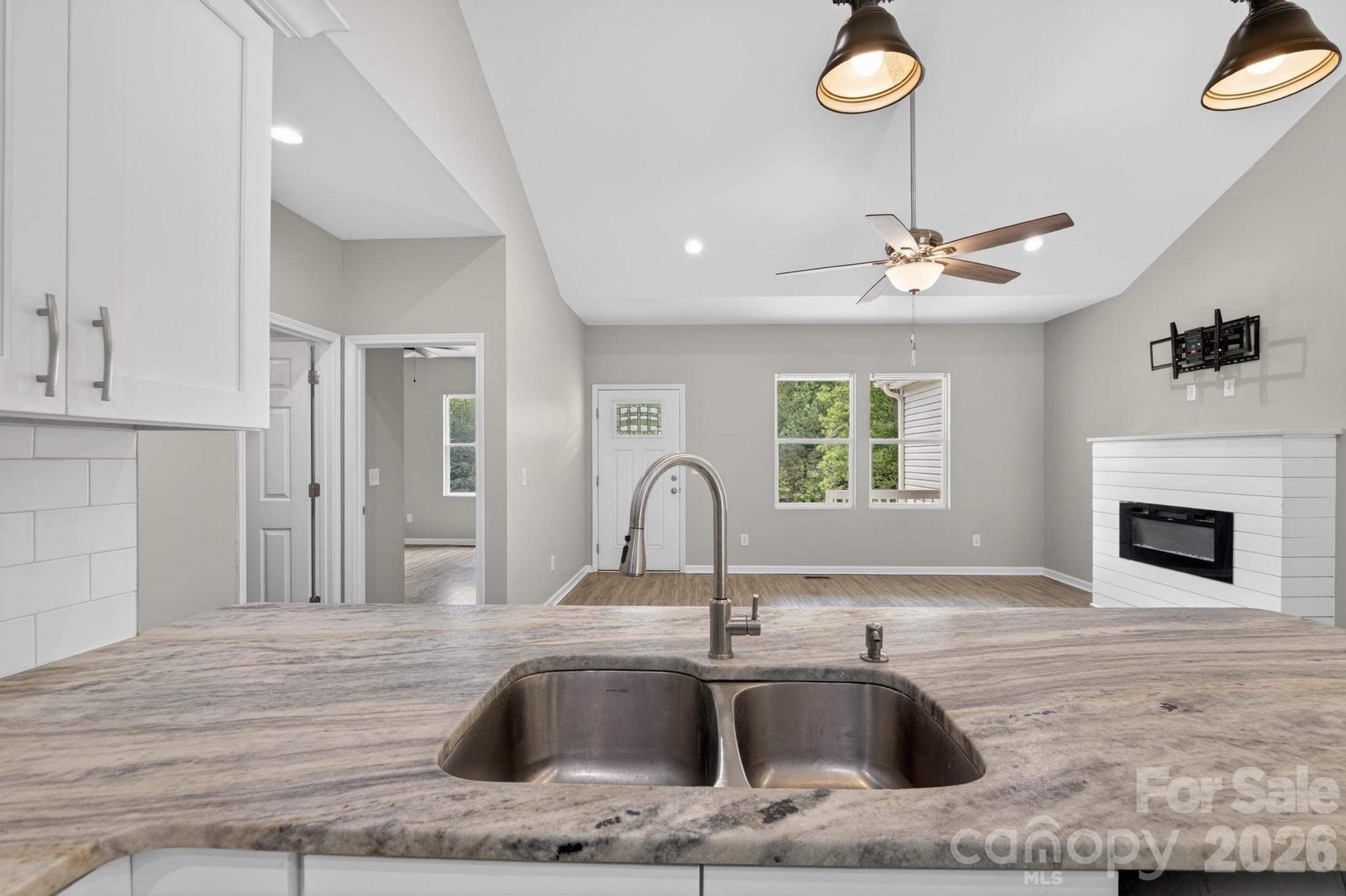 2119 South Road Morganton, NC 28655 - Photo 18 of 47 a kitchen with a sink cabinets and window